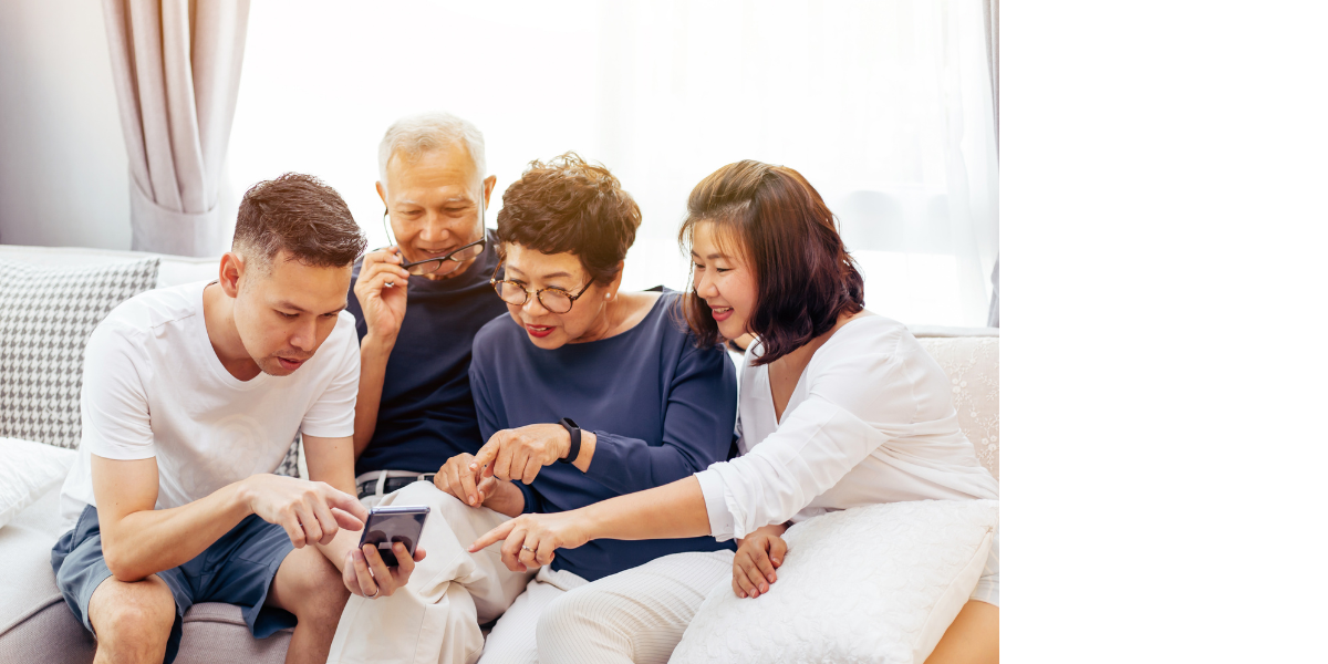A multigenerational family sharing a conversation together
